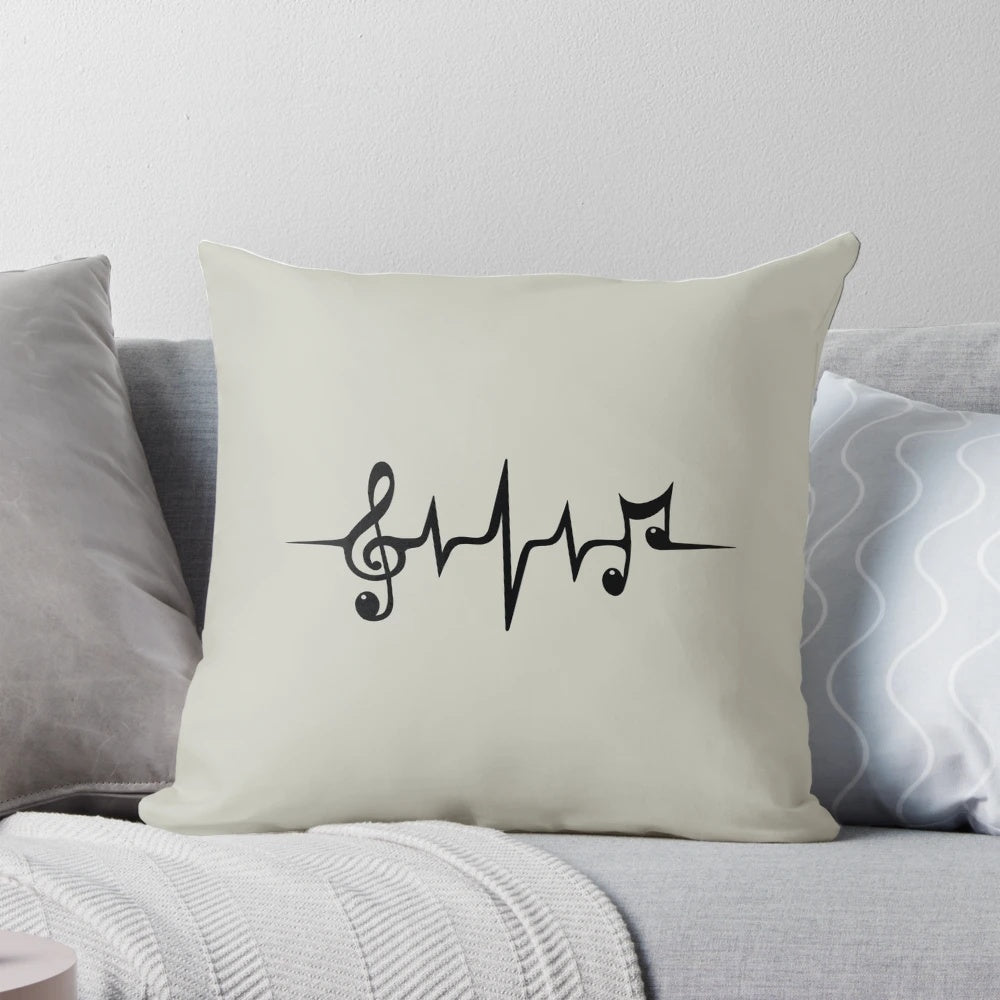 A cozy music-themed pillow featuring a heart-shaped waveform design and musical symbols