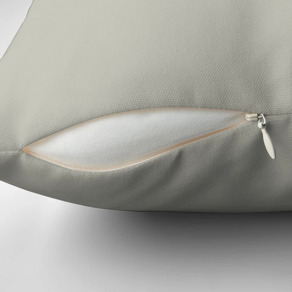 A cozy music-themed pillow featuring a heart-shaped waveform design and musical symbols