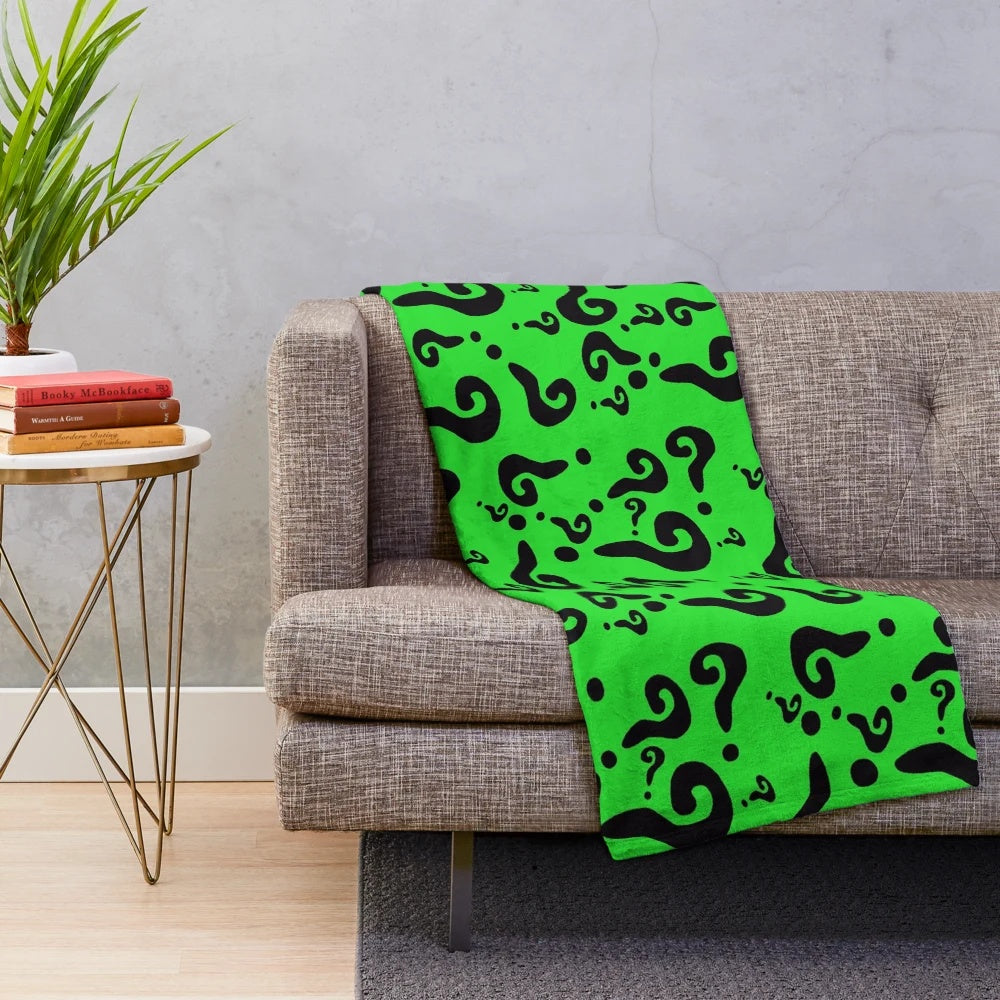 Riddler-inspired plush blanket featuring a green and question mark design