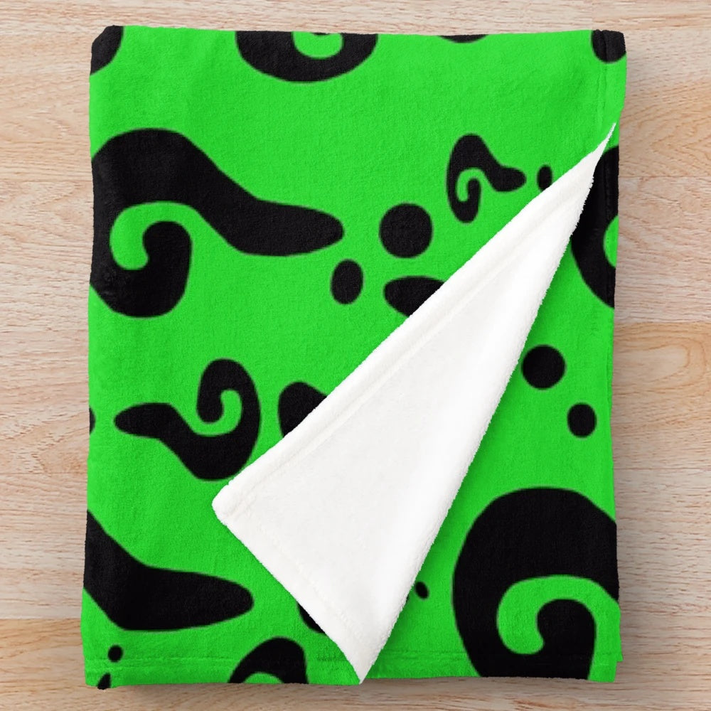 Riddler-inspired plush blanket featuring a green and question mark design