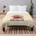 Plush blanket with biker and scooter design for cozy riding passion