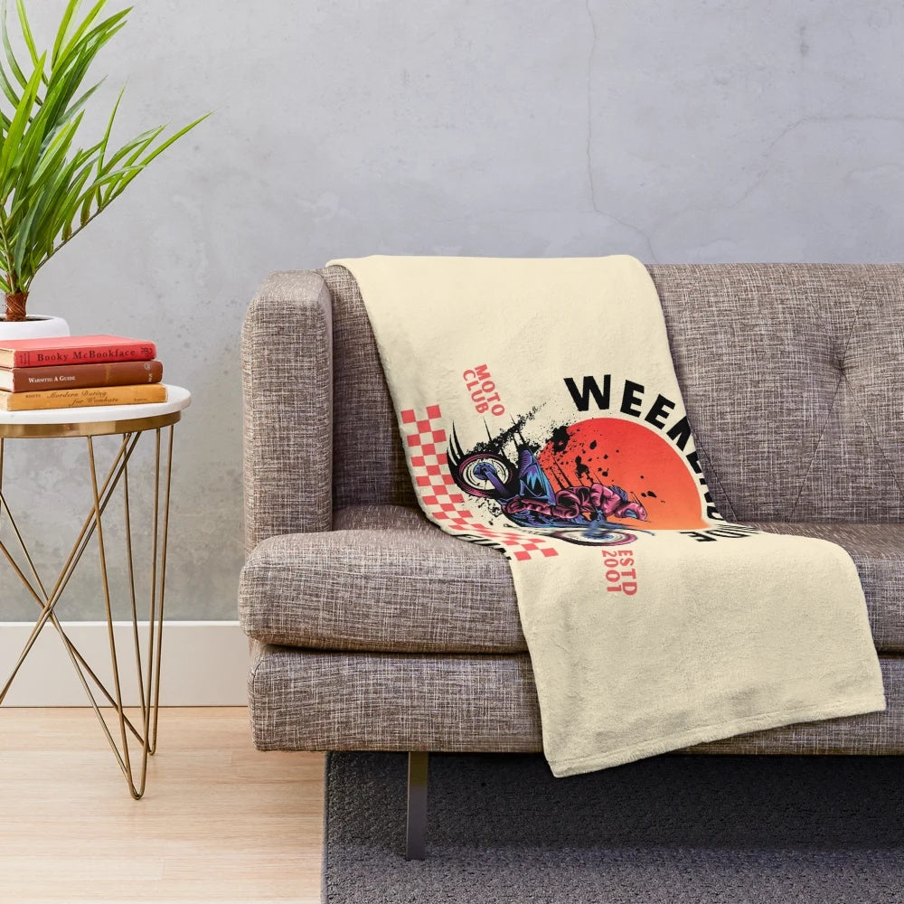 Plush blanket with biker and scooter design for cozy riding passion