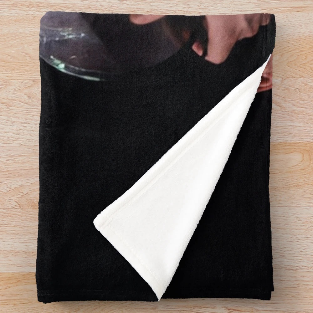 Rimmer-inspired plush blanket with Red Dwarf logo