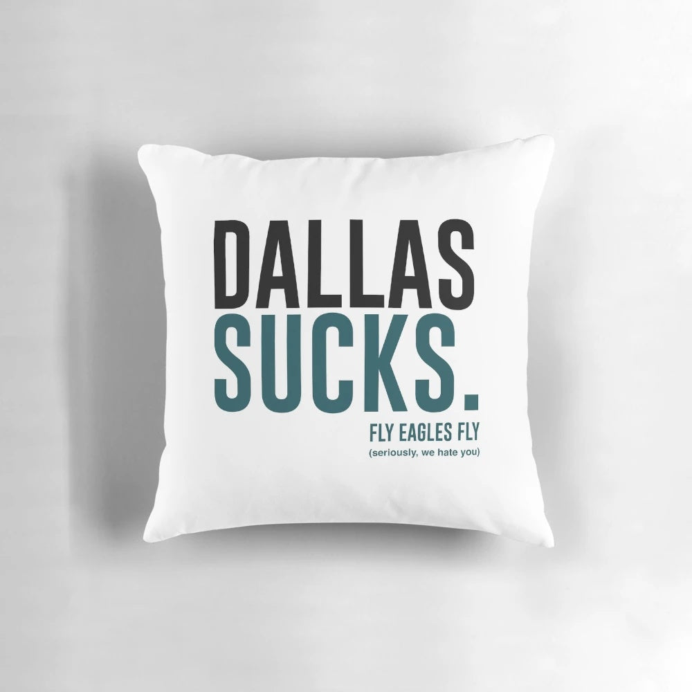 A throw pillow with the text "Dallas Sucks" printed on it, representing the rivalry between the Philadelphia Eagles and Dallas Cowboys in the NFC East.