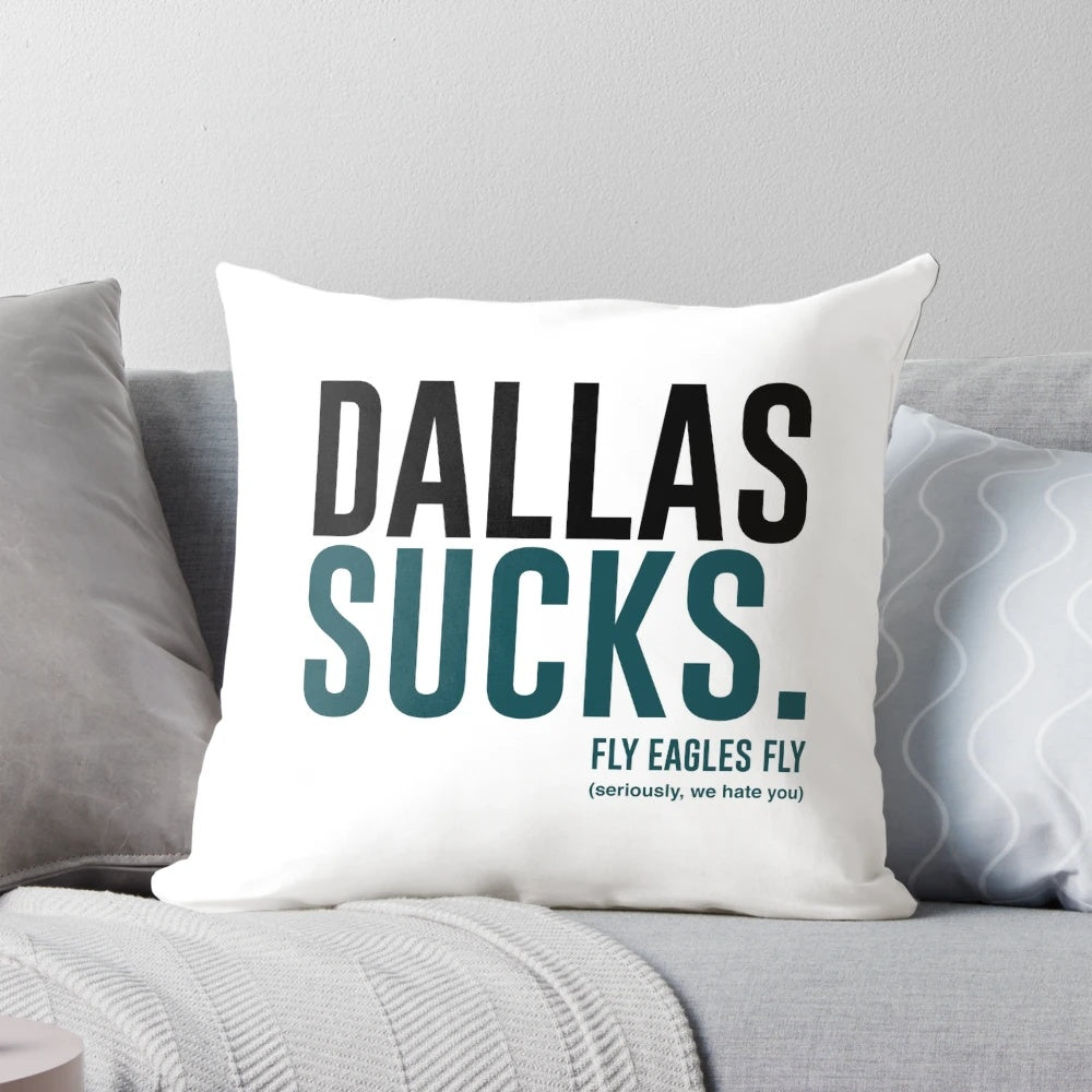 A throw pillow with the text "Dallas Sucks" printed on it, representing the rivalry between the Philadelphia Eagles and Dallas Cowboys in the NFC East.