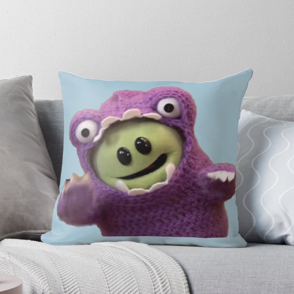 "A cozy pillow featuring a roaring monster, perfect for Nanalan meme and TikTok enthusiasts"