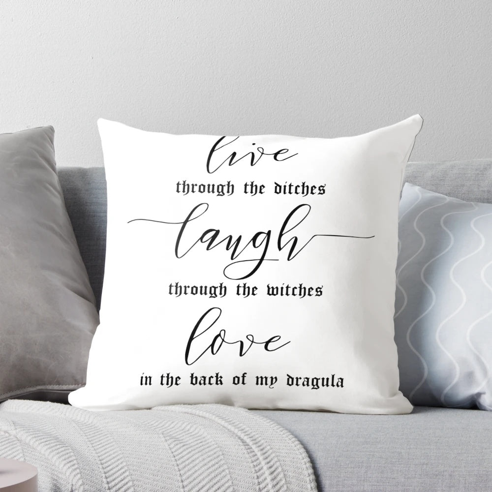 Colorful throw pillow featuring the text "Live Laugh Love" with a Dragula meme design, inspired by the music of Rob Zombie.