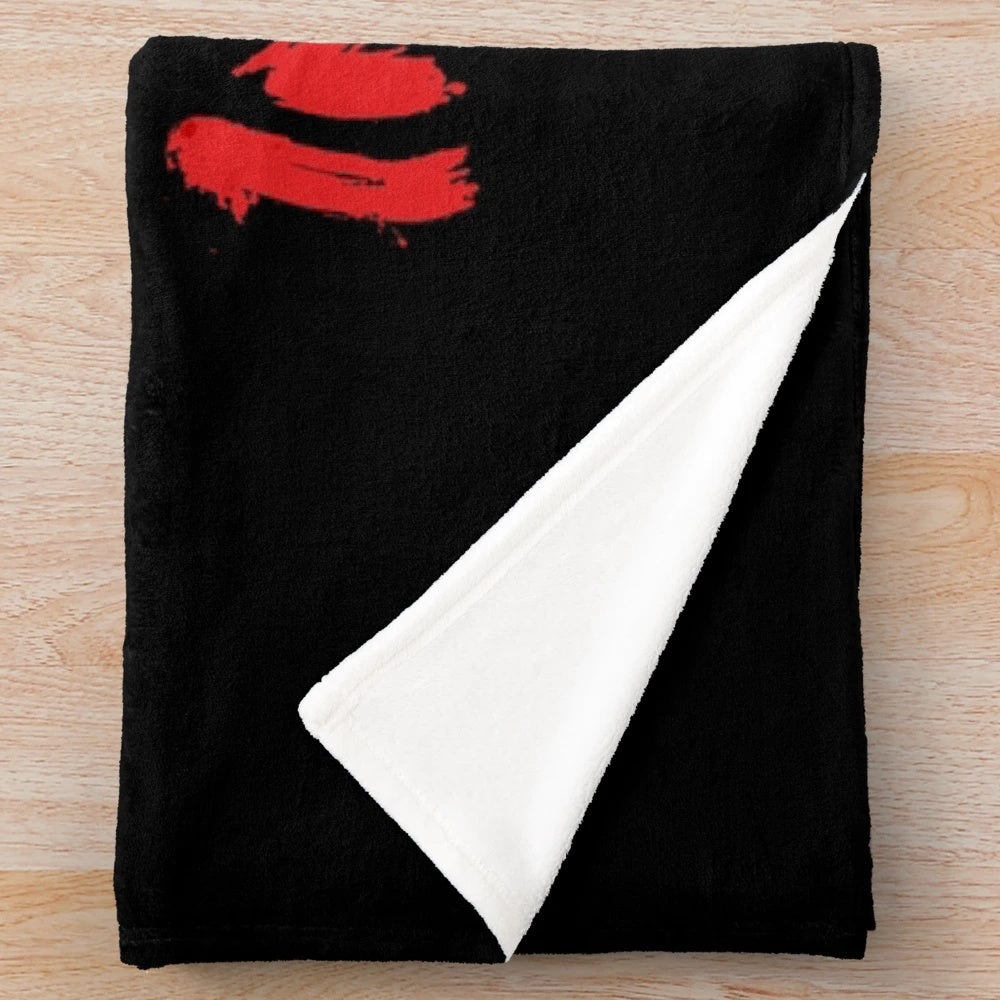 Rock-inspired plush blanket with guitar and music-themed lettering