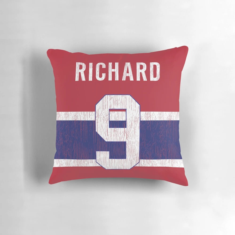 Image of a plush rocket-shaped pillow representing the Montreal Canadiens hockey team