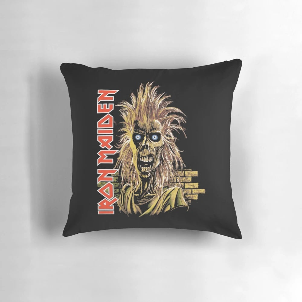 Iron Maiden skeleton pillow with a brick wall background