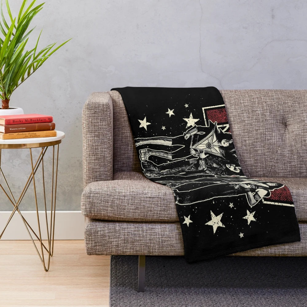KISS-inspired plush blanket with the band's logo and text