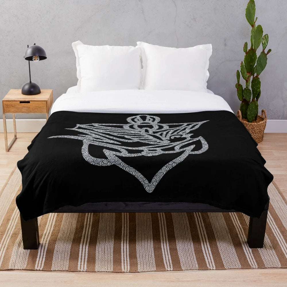 Plush blanket featuring a guitar design