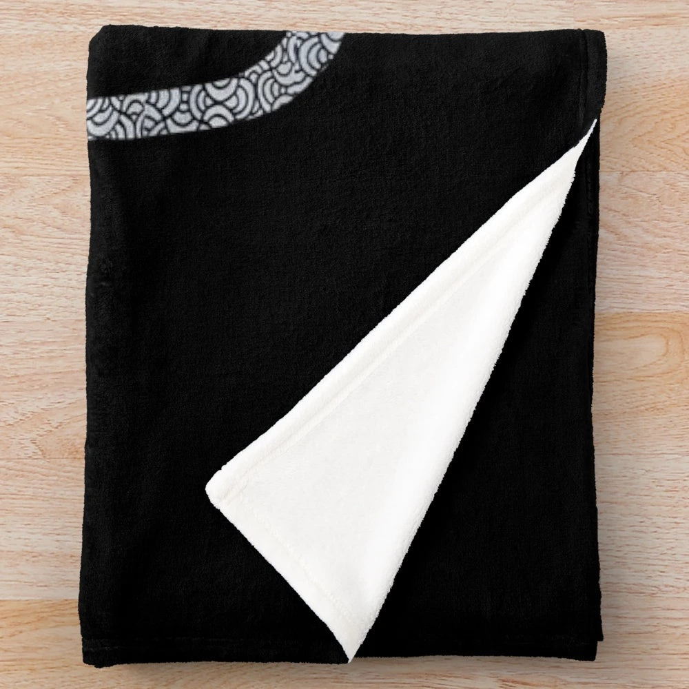 Plush blanket featuring a guitar design