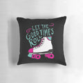 A decorative pillow featuring the phrase "Let the Good Times Roll" in a hand-lettered style, with roller skate illustrations.