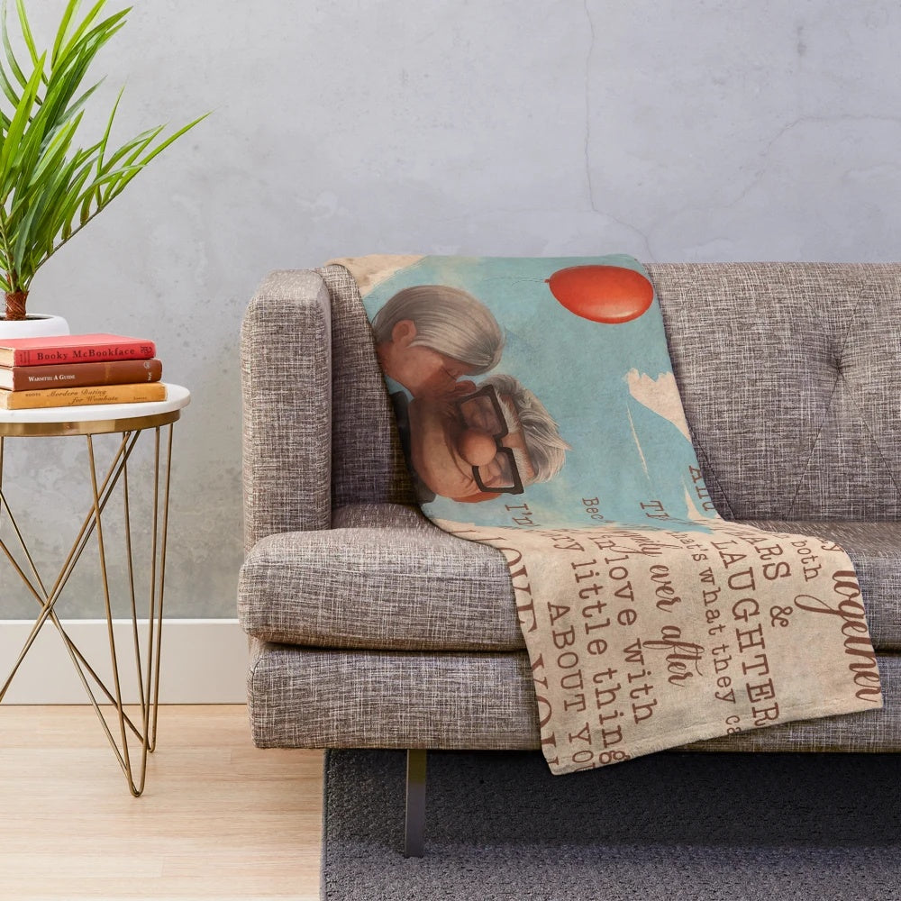 Soft and cozy plush blanket featuring the beloved characters Carl and Ellie from the movie Up