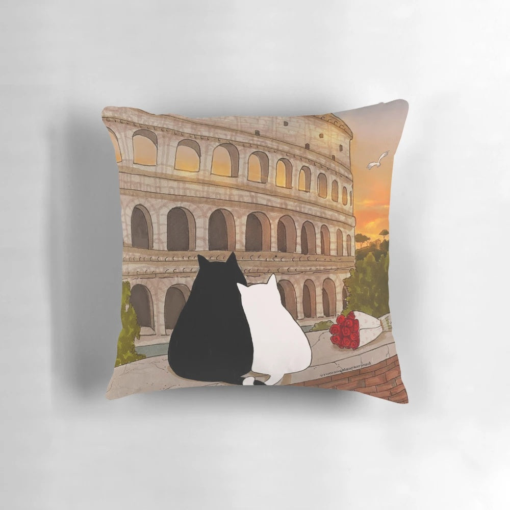 A cozy cat-themed pillow featuring a beautiful sunset view of the iconic Colosseum in Rome, Italy.