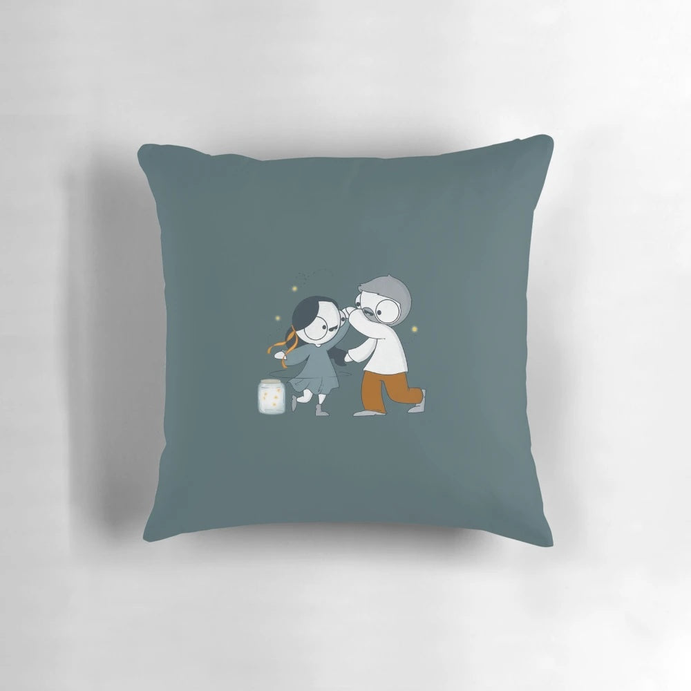 A decorative pillow featuring a dancing couple from the popular Catana Comics series.