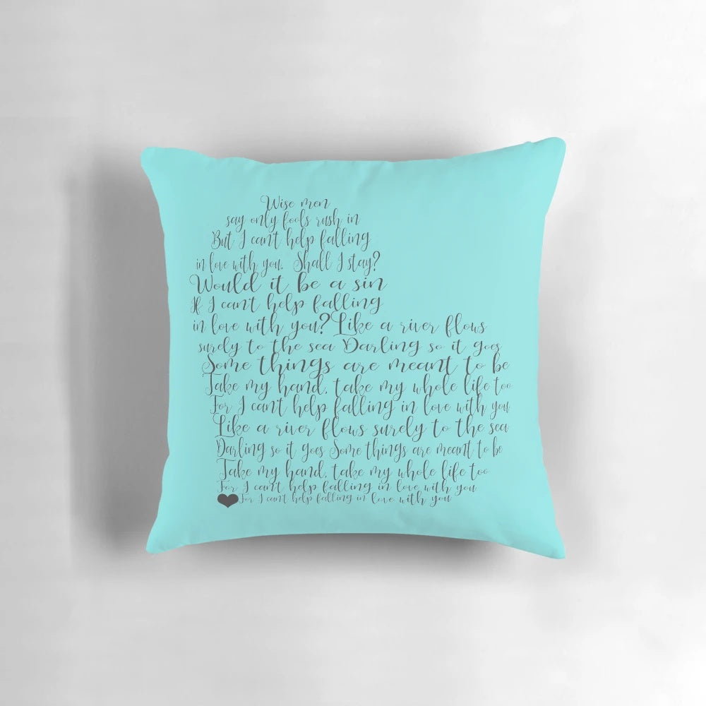 Plush pillow featuring the romantic lyrics of Elvis Presley's classic song "I Can't Help Falling in Love"