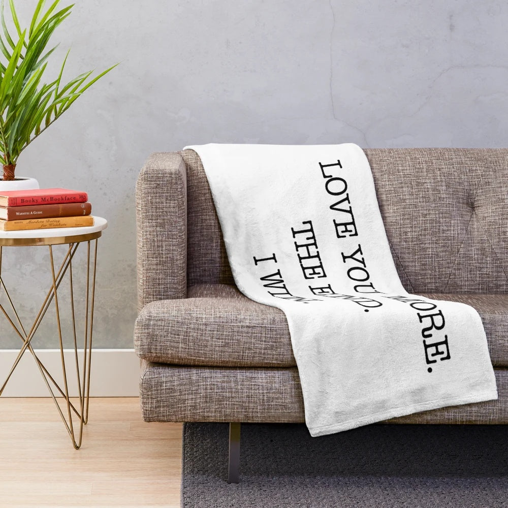 Plush blanket with the text "Love you more. The end. I win.