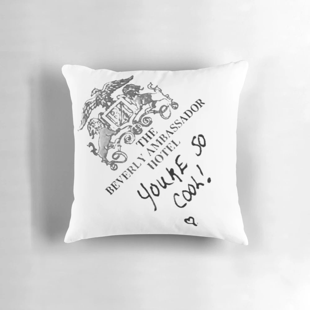 Decorative throw pillow featuring the handwritten quote "You're So Cool!" from the 90s alternative film