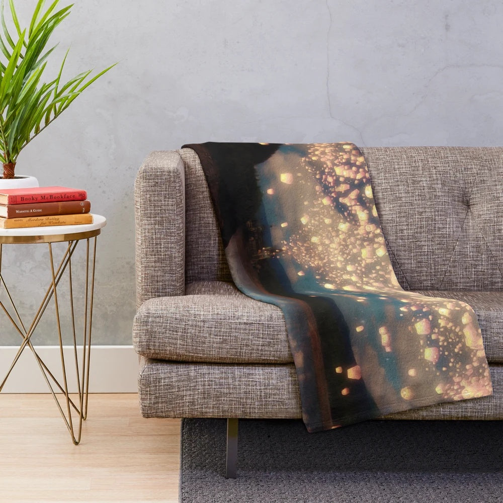 Plush blanket with scenic design of flying wish lanterns in a romantic sky landscape