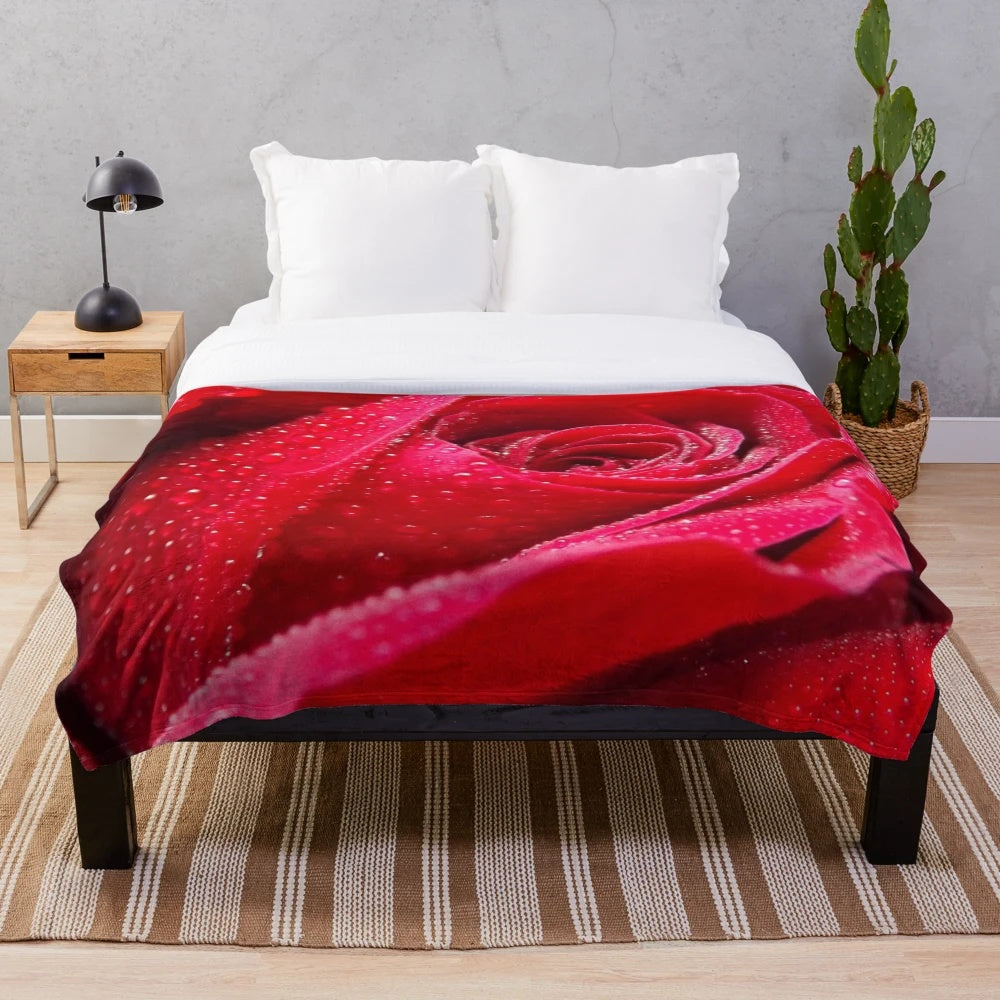 Soft and luxurious plush blanket featuring a vibrant rose floral pattern