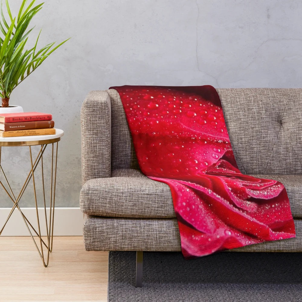 Soft and luxurious plush blanket featuring a vibrant rose floral pattern