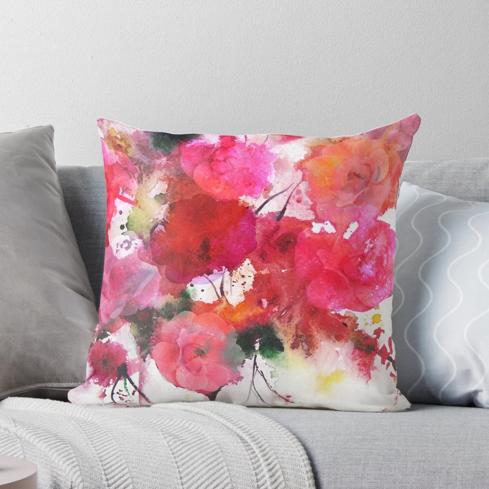 Artistic still life image of romantic pink roses in a watercolor painting style, featured on a decorative pillow.