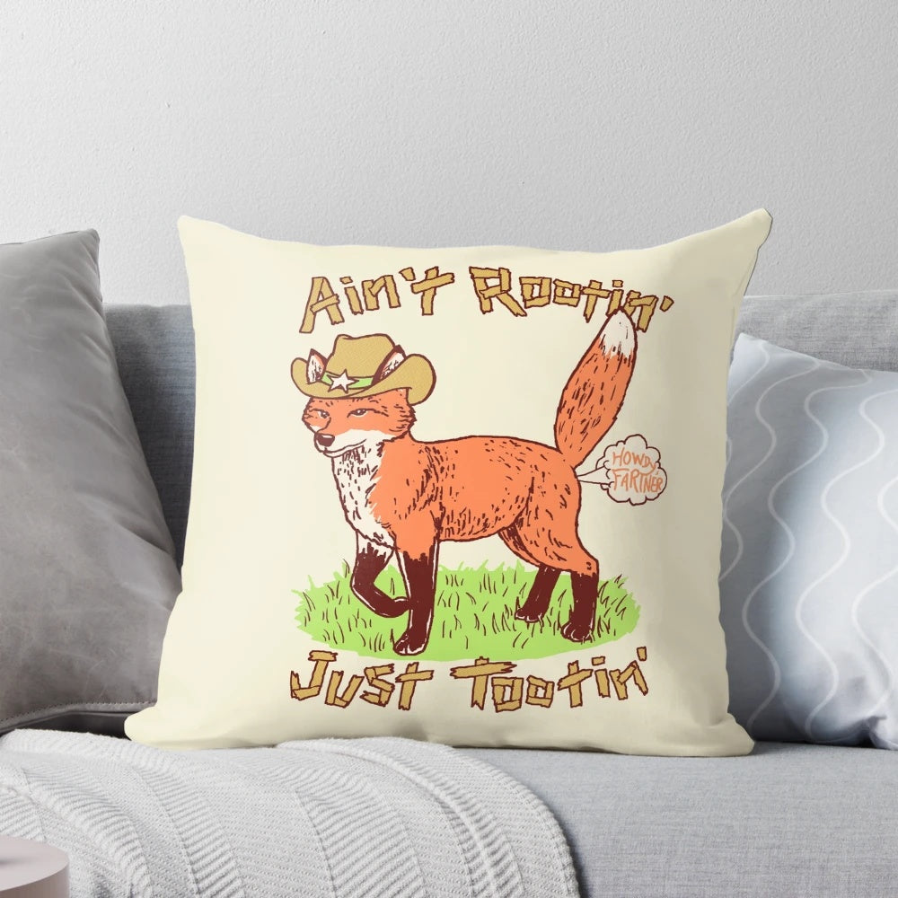 Rustic pillow featuring a fox in cowboy attire, perfect for a wild west-themed room.