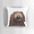 A colorful painting portrait of the Muppet character Rowlf the Dog on a decorative pillow.