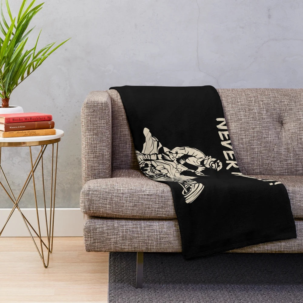 Plush blanket featuring an ATV quad racing design