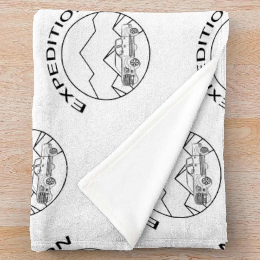 Expedition plush blanket in a mountain landscape