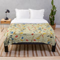 Cozy plush blanket featuring the iconic Rummikub stones pattern