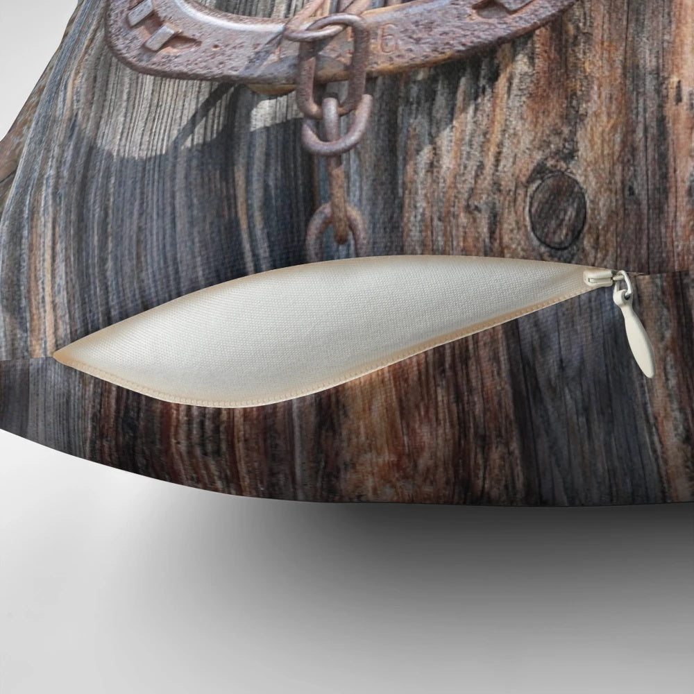 Rustic barn wood pillow with distressed equestrian horseshoe design