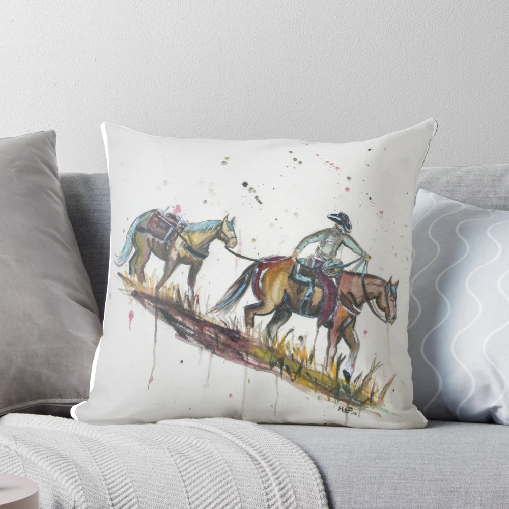 Cowboy packing on a pillow with abstract western motif