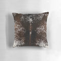 Cowhide tan brown and white decorative pillow with a western or country style design