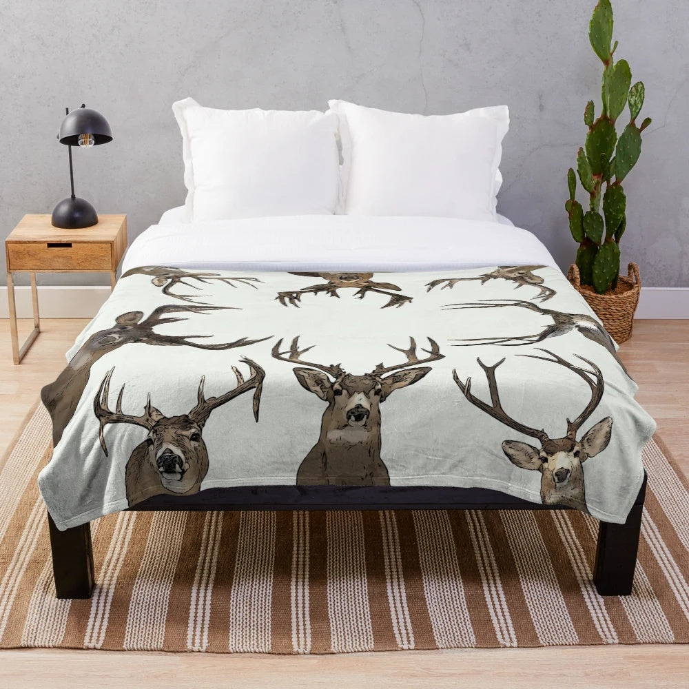 Rustic plush blanket with deer antlers and wildlife in a farmhouse collage design