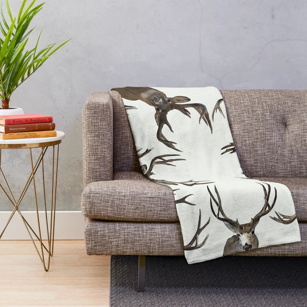 Rustic plush blanket with deer antlers and wildlife in a farmhouse collage design