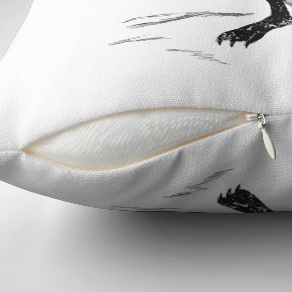 A decorative square pillow with a western-inspired owl design, featuring a fistful of feathers and a rustic, farmhouse aesthetic.