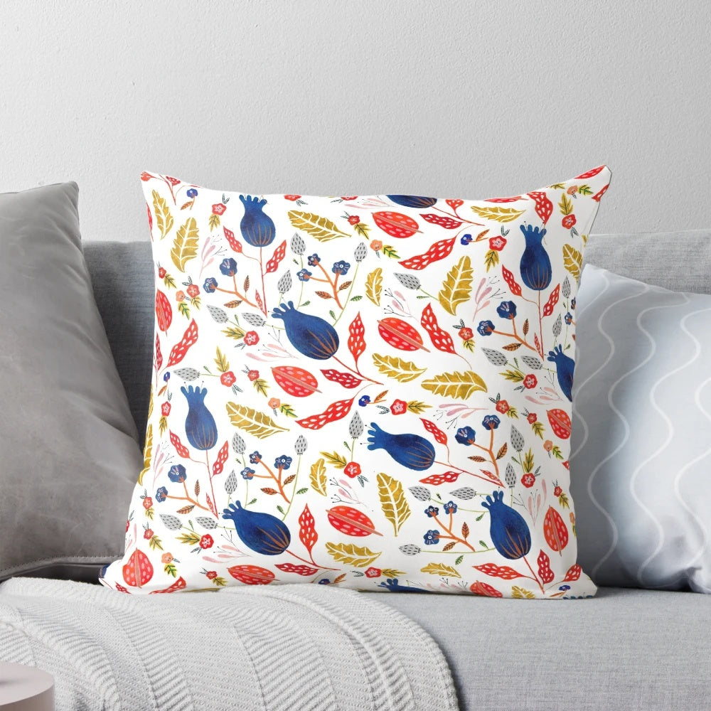 Rustic floral throw pillow with a hand-painted botanical design in vibrant colors
