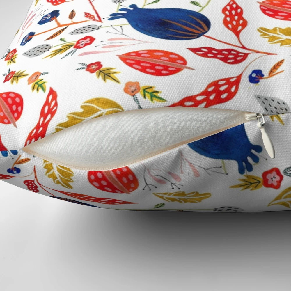 Rustic floral throw pillow with a hand-painted botanical design in vibrant colors