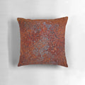 Rusted metallic pillow with industrial, vintage appeal