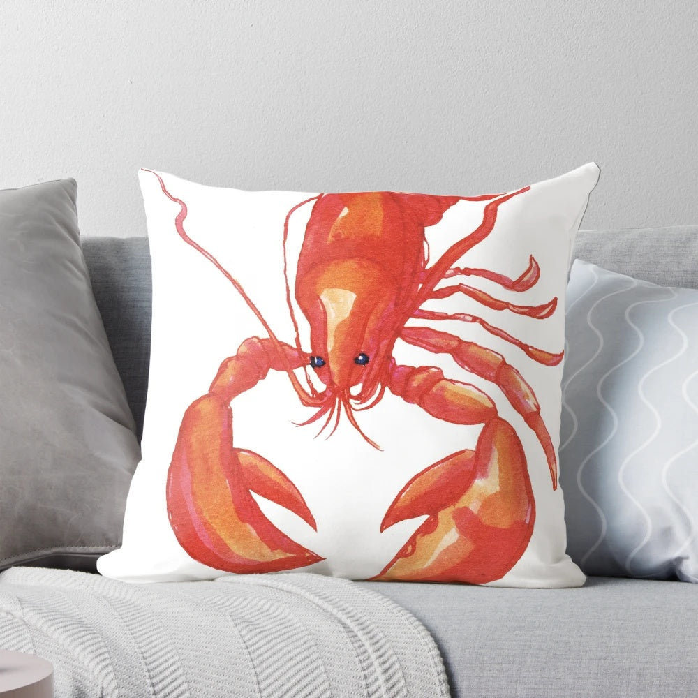 Vibrant orange lobster-shaped pillow with a textured rocky design, perfect for ocean-themed home accents.