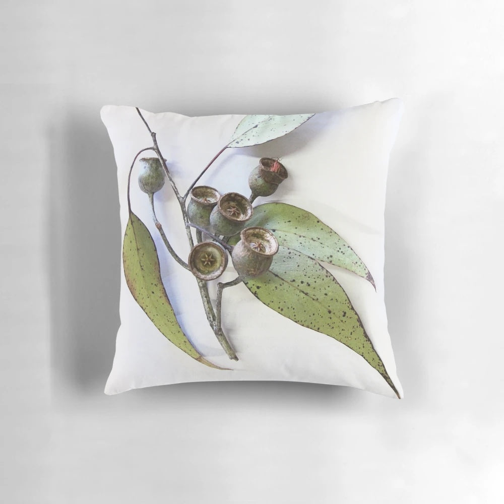 Decorative pillow featuring natural marri eucalyptus leaves and nuts from Western Australia