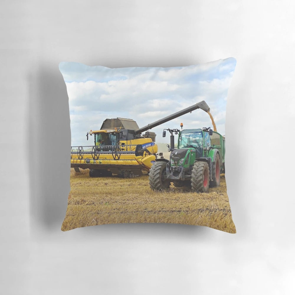 Modern harvest pillow with combine harvester, wheat, and tractor design