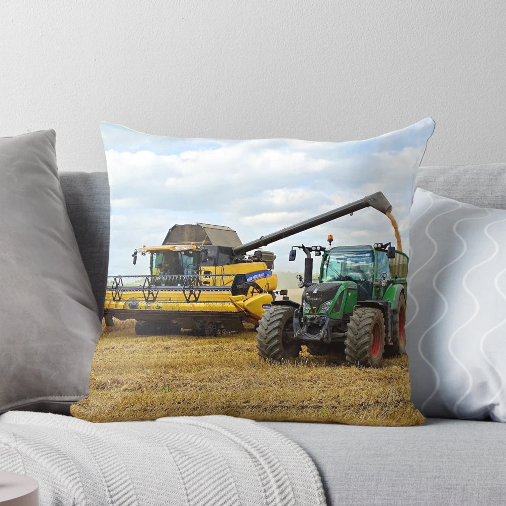 Modern harvest pillow with combine harvester, wheat, and tractor design