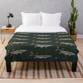 Musky fish drawing on a dark green plush blanket