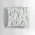 Cozy pine and eucalyptus pillow with watercolor foliage design