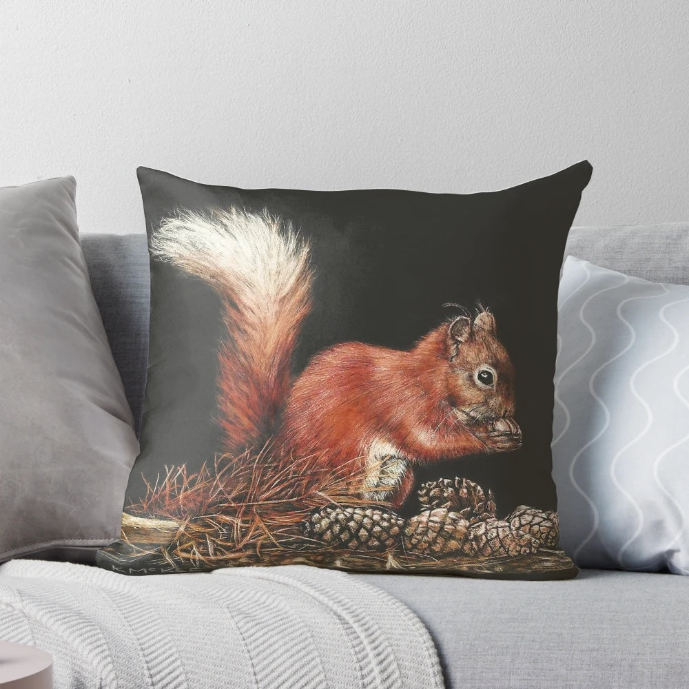 Decorative throw pillow with a squirrel design in a scratchboard style, surrounded by pine cones on a neutral background.