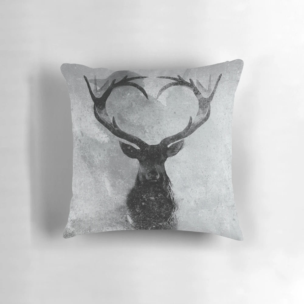 Closeup image of a decorative pillow featuring a realistic stag or deer design